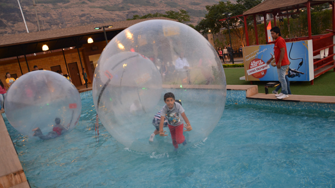 Enojy  thrilling sport Water Zorb at Della