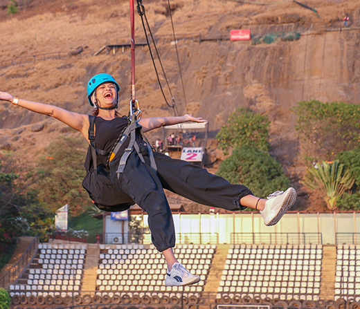 Perform India's Longest Flying Fox at Della Adventure Park