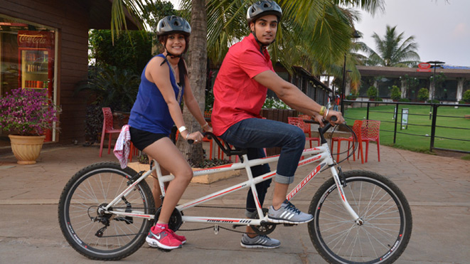 Ride Double Seater Tandem Cycle with your partner at Della Adventure Park