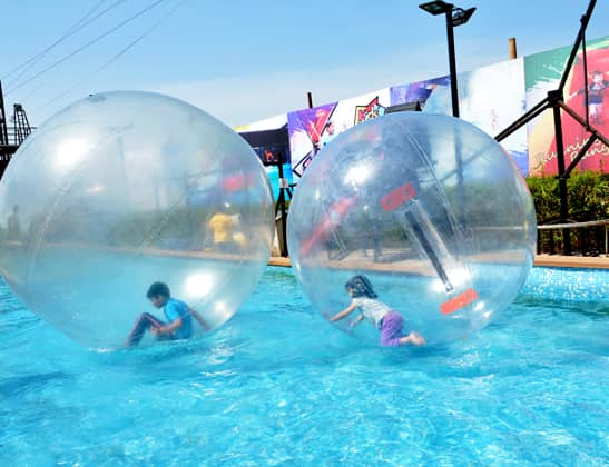 Play Water Zorbing at Della Adventure