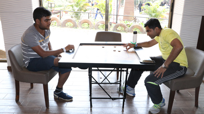 Play Carrom at Della Adventure Park