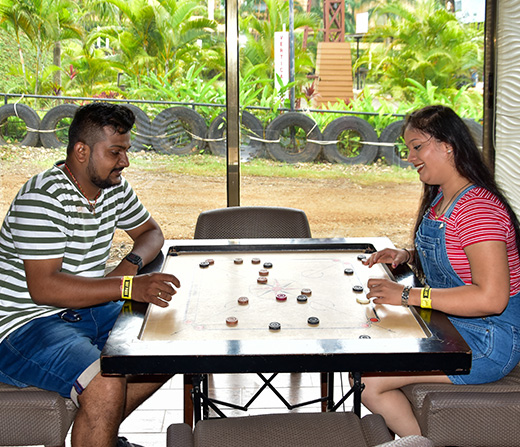 Play Carrom at Della Adventure